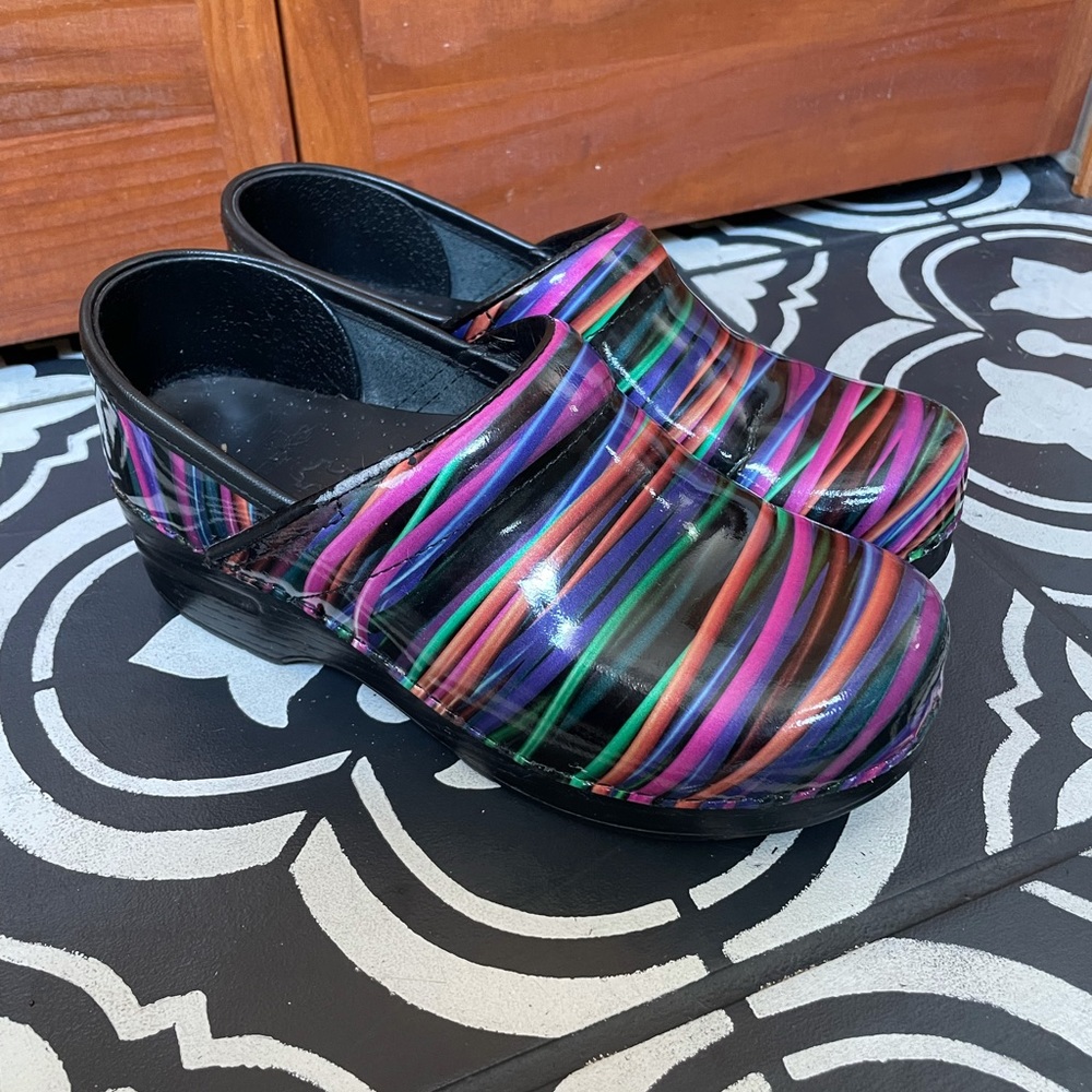 Dansko multi colored patent leather clogs